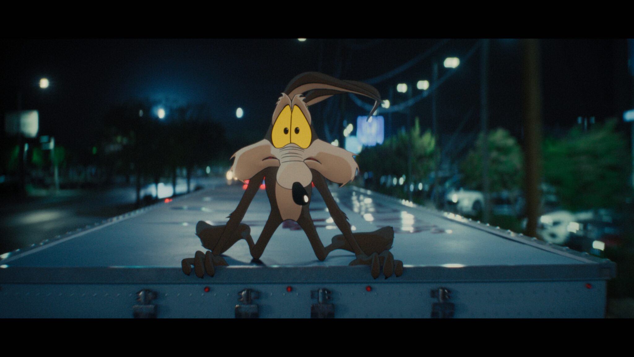 Wile E. Coyote riding a wheeled ACME device in Coyote vs. Acme (2026)