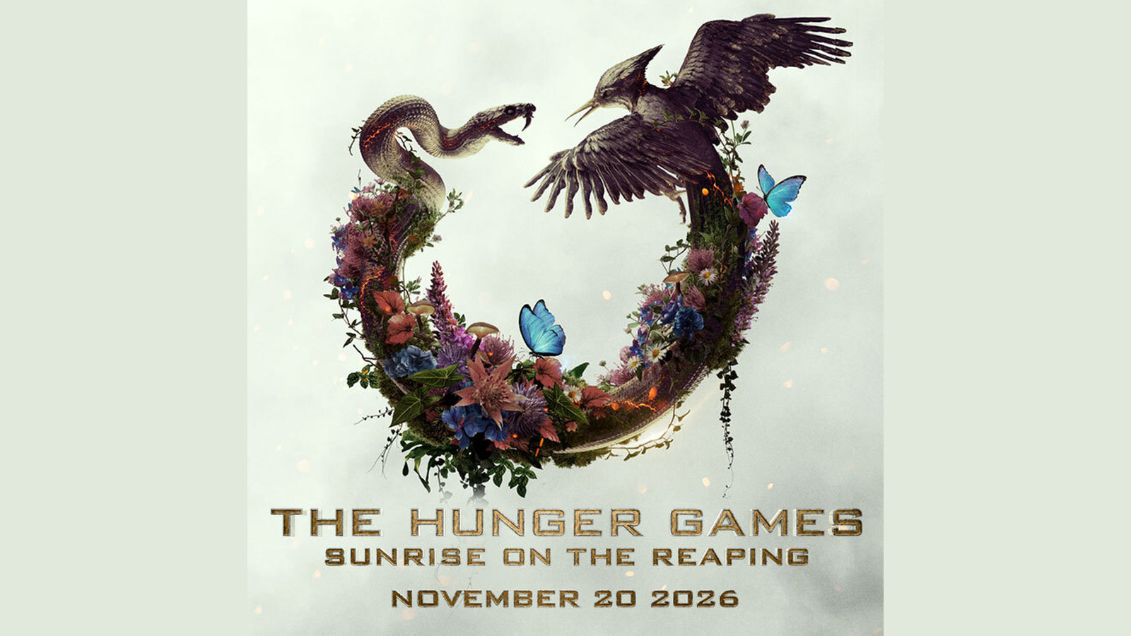 Official key art for The Hunger Games: Sunrise on the Reaping: a snake and a mockingjay-like bird forming a circle of flowers and butterflies above the gold title and November 20 2026