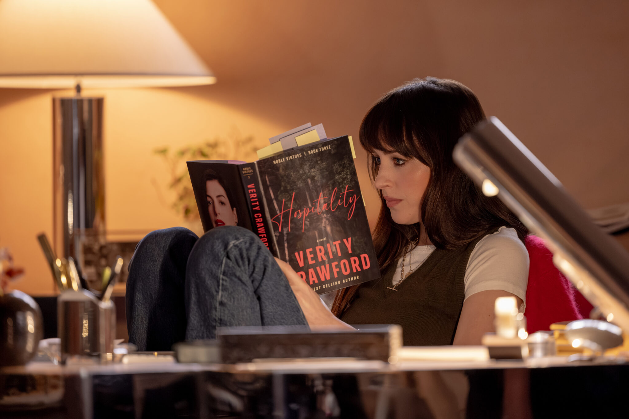 Verity (2026): Lowen Ashleigh reading a Verity Crawford novel